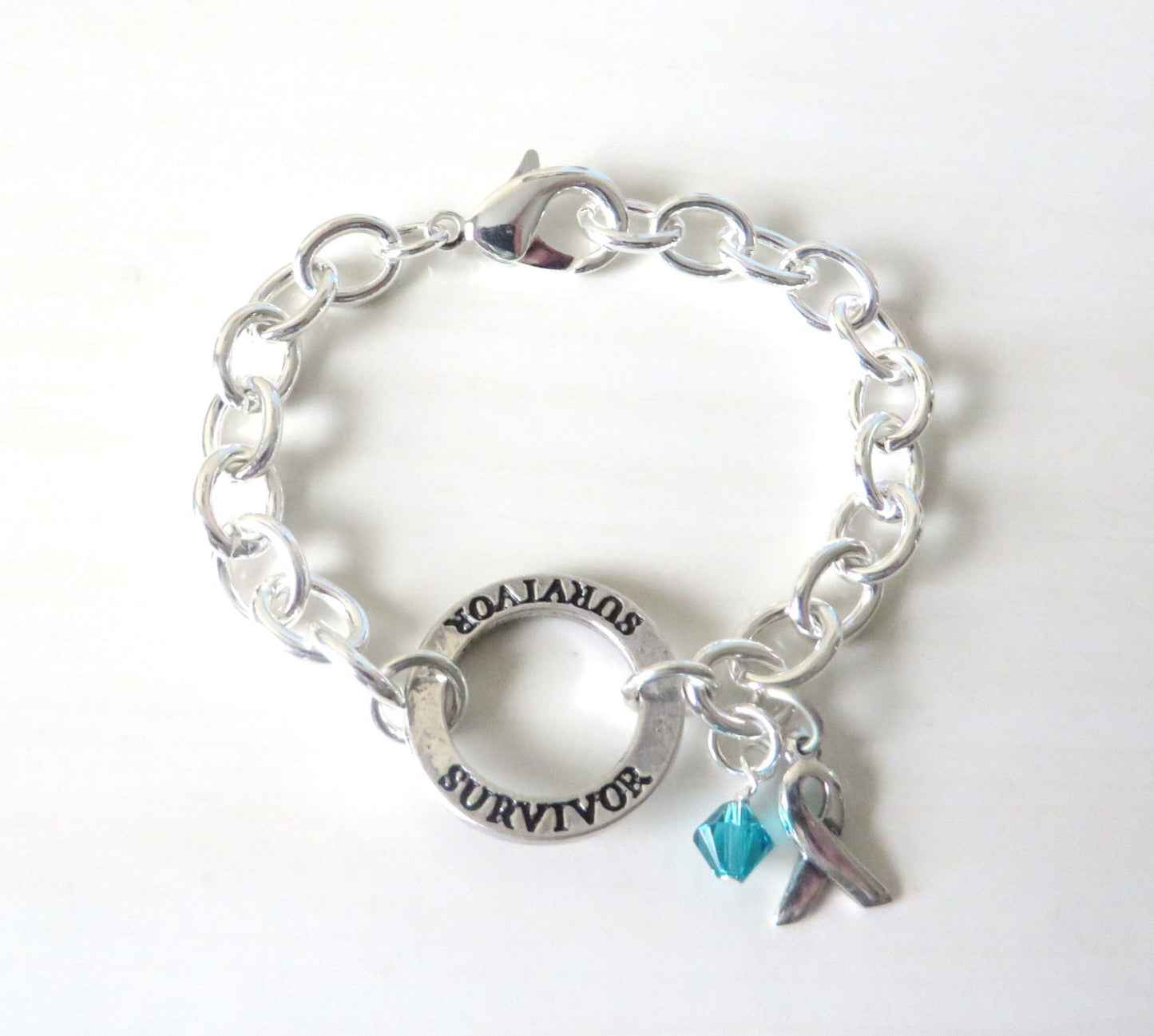Survivor Teal Crystal Charm Bracelet Ovarian Cancer Tourettes Syndrome Ocd Anxiety Awareness Ptsd