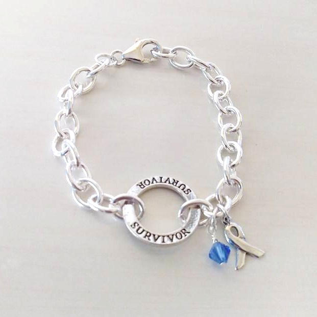 Survivor Blue Charm Bracelet Crystal Charm and Silver Awareness Ribbon Colon Cancer Arthritis Child Abuse Dystonia Reyes Syndrome